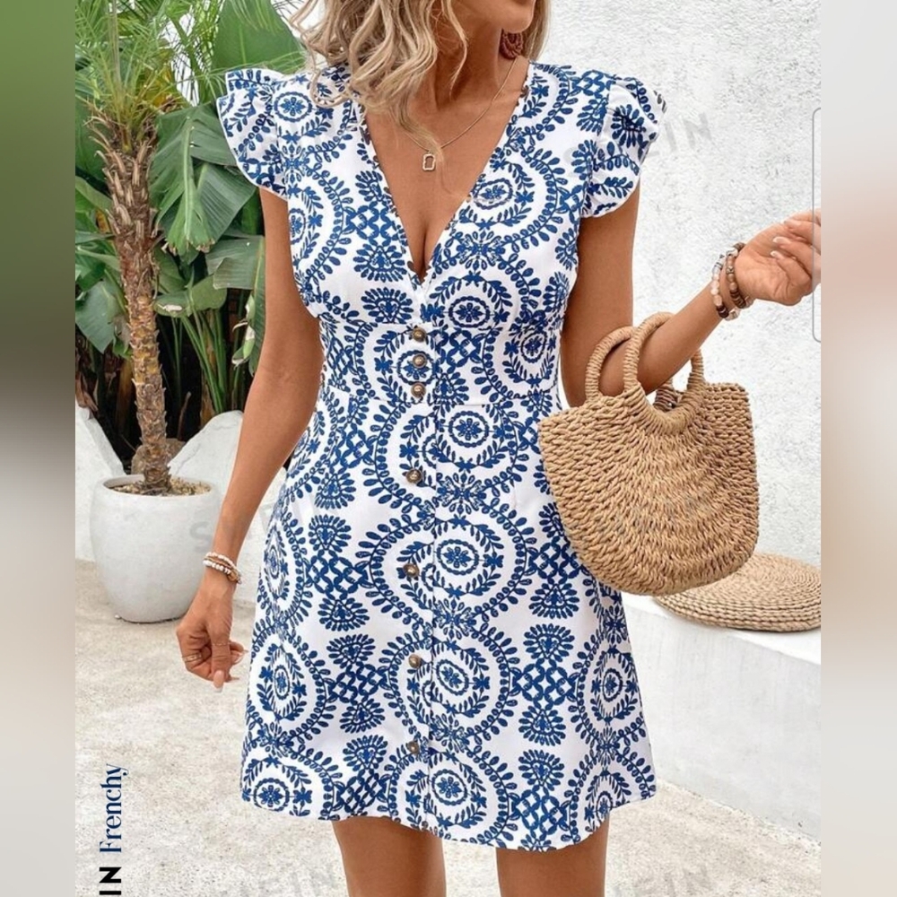 Blue & white v-neck dress with flutter sleeves. Button closure. Lightweight.